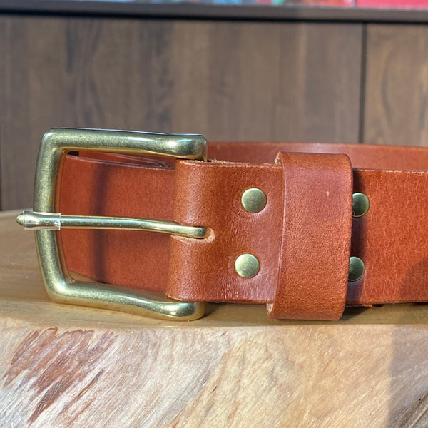 Tan belt with brass buckle